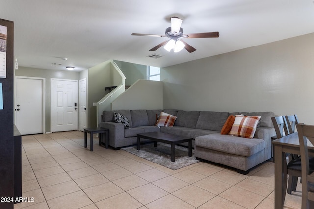1706 W Coolidge Way, Coolidge, AZ 85128 - living room featuring stairs, a ceiling fan, visible vents, and light tile patterned floors