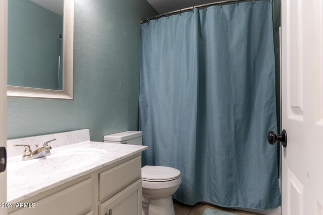 1706 W Coolidge Way, Coolidge, AZ 85128 - full bath featuring vanity, tile patterned floors, toilet, and curtained shower