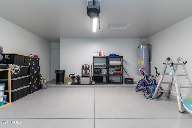 1706 W Coolidge Way, Coolidge, AZ 85128 - garage featuring a garage door opener and water heater