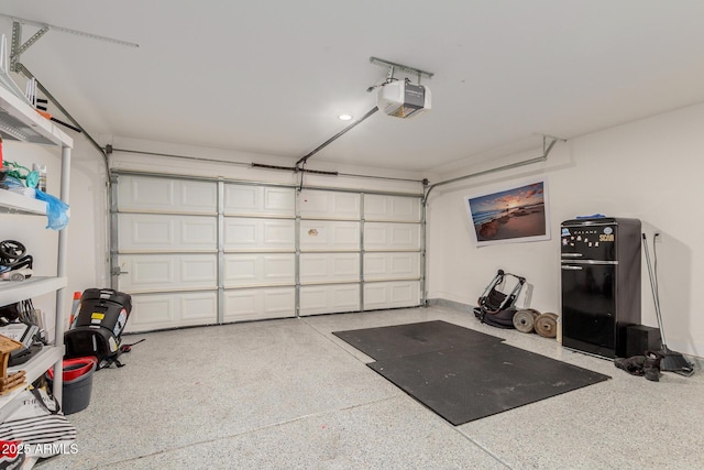 garage featuring a garage door opener