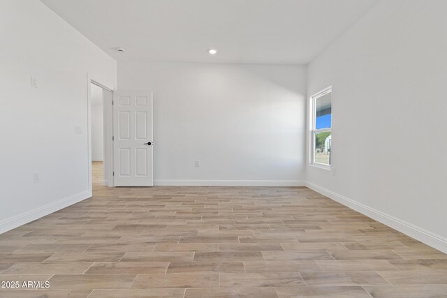 1222 S 365th Ave, Tonopah, AZ 85354 - empty room featuring baseboards, light wood-type flooring, and recessed lighting