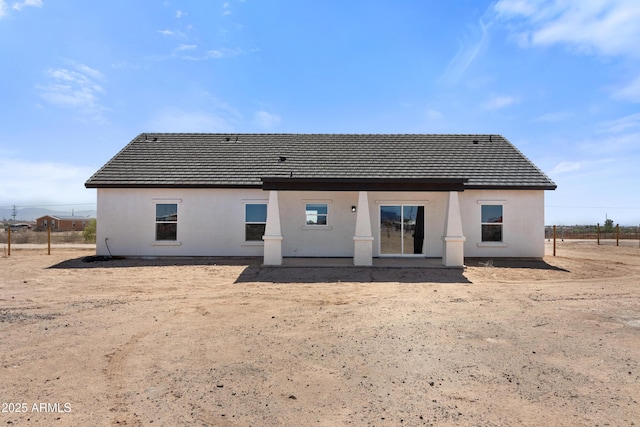 1222 S 365th Ave, Tonopah, AZ 85354 - back of house featuring stucco siding and a tile roof