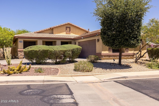 view of front of home with a garage