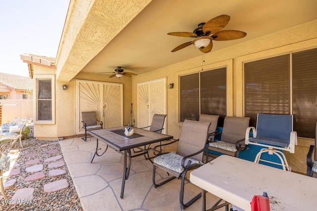 view of patio / terrace featuring ceiling fan