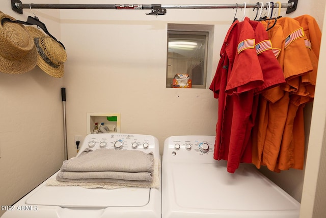 washroom featuring washing machine and dryer