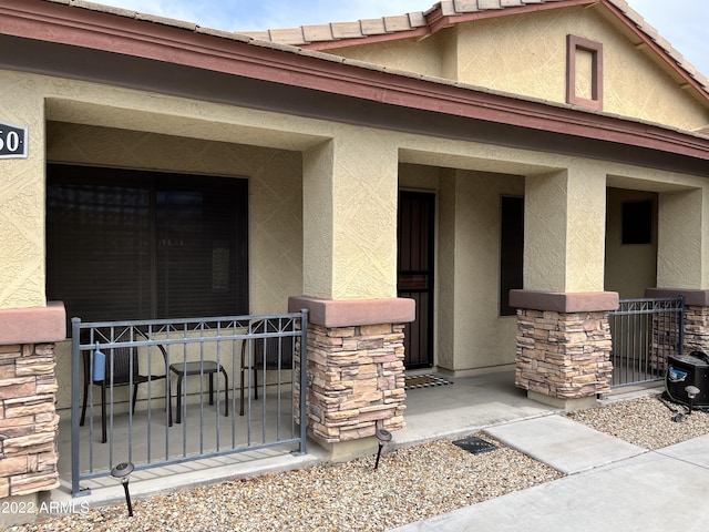 property entrance with a porch