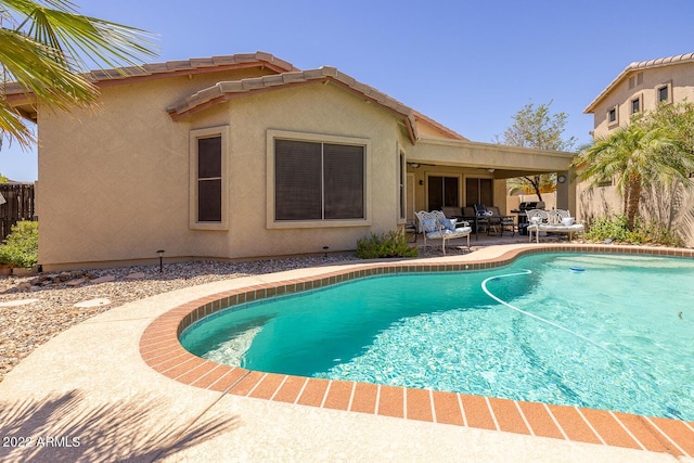 view of pool with a patio