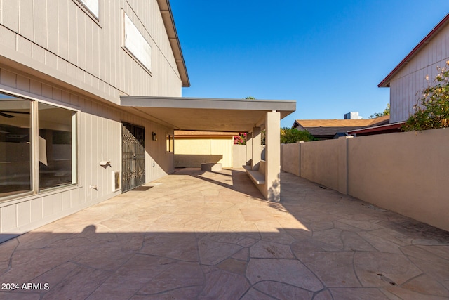 view of patio / terrace featuring a shed