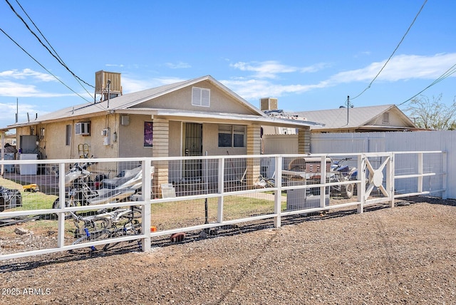 11507 N 79th Dr, Peoria, AZ 85345 - view of front of home featuring stucco siding and a chimney