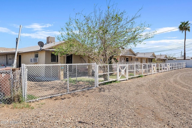 11507 N 79th Dr, Peoria, AZ 85345 - view of front of house featuring a gate, stucco siding, and fence