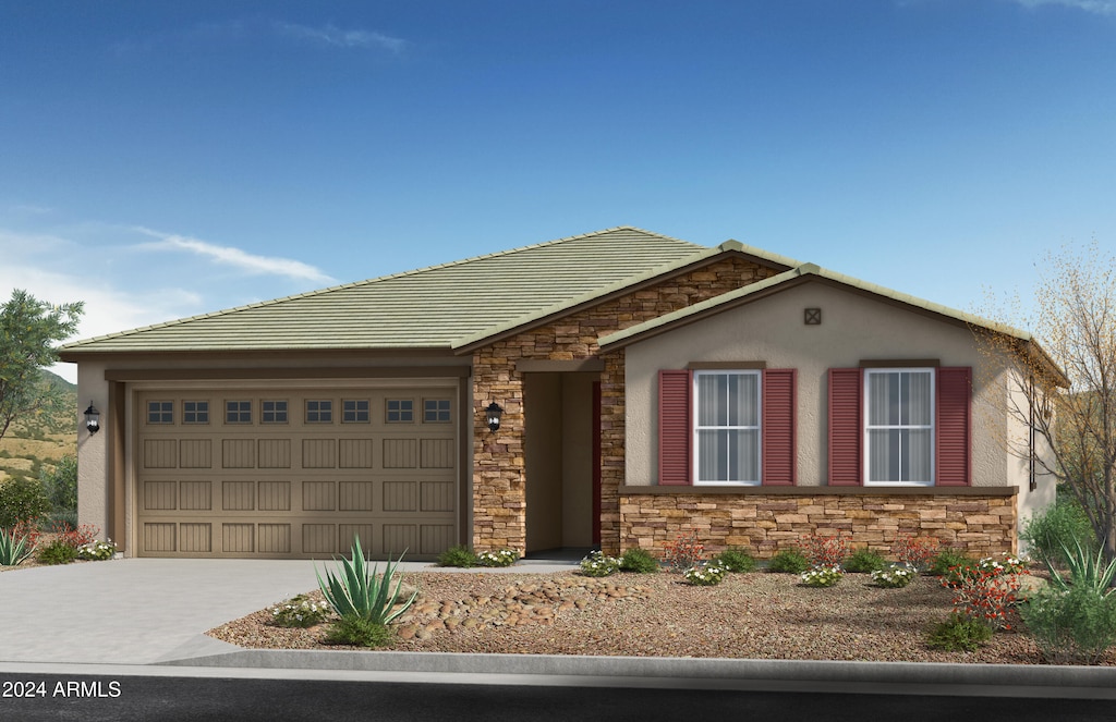 view of front of property with a garage