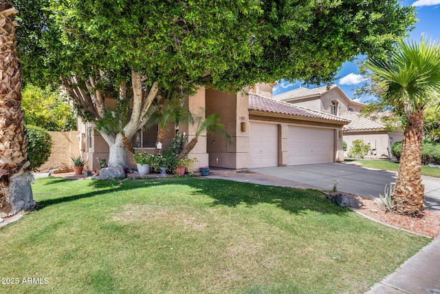 view of front of house featuring a garage, concrete driveway, stucco siding, a front yard, and a tile roof