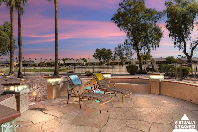 3507 N Snead Dr, Goodyear, AZ 85395 - patio terrace at dusk with a patio and a residential view
