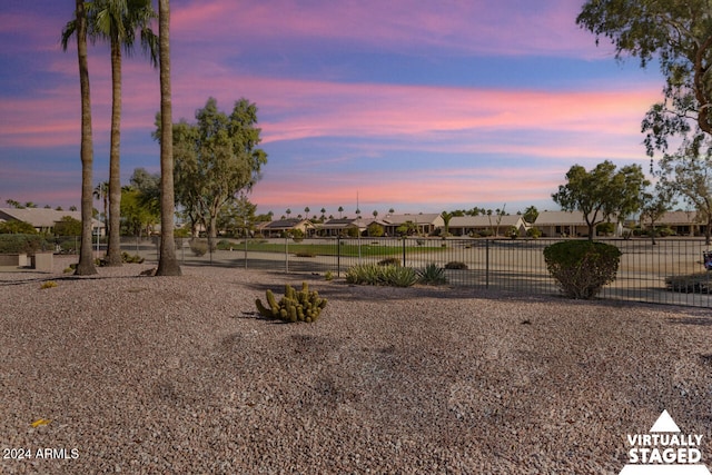 3507 N Snead Dr, Goodyear, AZ 85395 - yard at dusk featuring a residential view