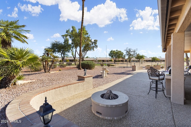 3507 N Snead Dr, Goodyear, AZ 85395 - view of patio / terrace featuring an outdoor fire pit