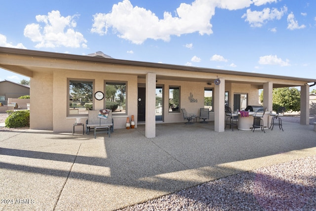 3507 N Snead Dr, Goodyear, AZ 85395 - back of property featuring stucco siding and a patio
