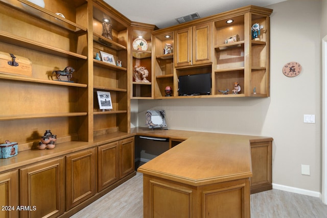 3507 N Snead Dr, Goodyear, AZ 85395 - office with built in study area, light wood-style flooring, and baseboards