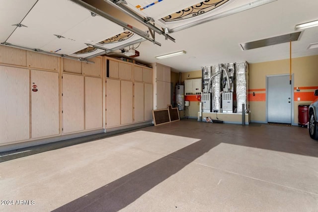 3507 N Snead Dr, Goodyear, AZ 85395 - garage featuring gas water heater and a garage door opener