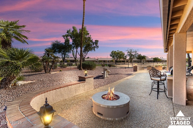 3507 N Snead Dr, Goodyear, AZ 85395 - view of patio featuring a fire pit