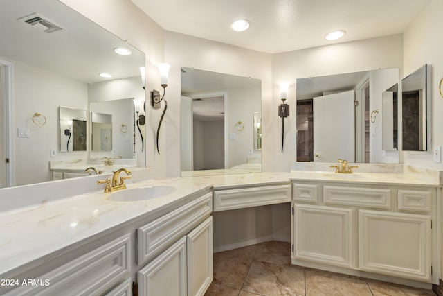 bathroom with vanity and tile patterned floors