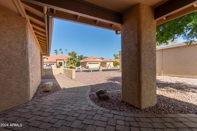 view of patio / terrace with a garage