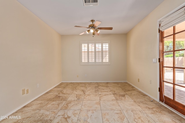 empty room featuring ceiling fan