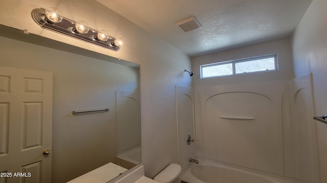 35005 N 30th Dr, Phoenix, AZ 85086 - full bath with a textured ceiling, toilet, visible vents, and shower / washtub combination