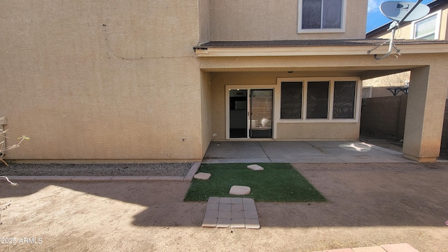 35005 N 30th Dr, Phoenix, AZ 85086 - property entrance with stucco siding, a patio, and fence