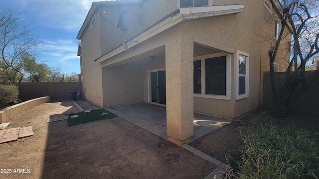 35005 N 30th Dr, Phoenix, AZ 85086 - rear view of property with stucco siding, a patio, and a fenced backyard