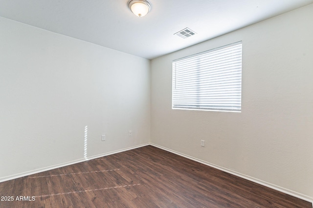 35005 N 30th Dr, Phoenix, AZ 85086 - empty room featuring visible vents, baseboards, and dark wood-style floors