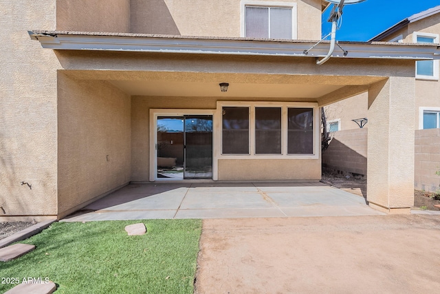 35005 N 30th Dr, Phoenix, AZ 85086 - property entrance with a patio area, stucco siding, and fence