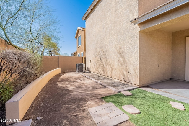 35005 N 30th Dr, Phoenix, AZ 85086 - exterior space featuring central AC unit, stucco siding, a patio, and fence