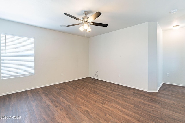 35005 N 30th Dr, Phoenix, AZ 85086 - empty room featuring baseboards, ceiling fan, and dark wood-style flooring