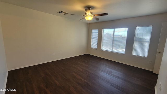 35005 N 30th Dr, Phoenix, AZ 85086 - spare room with visible vents, baseboards, dark wood-type flooring, and a ceiling fan