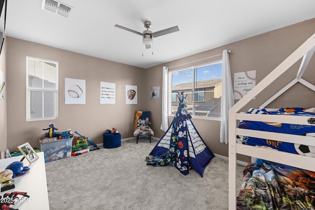 game room with ceiling fan and carpet floors