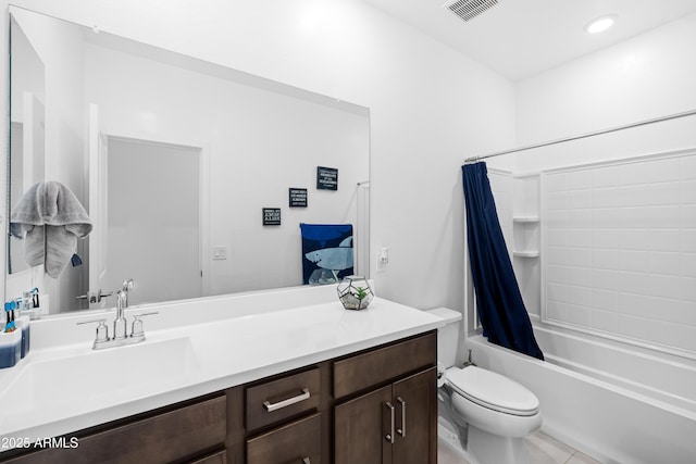 full bathroom featuring vanity, toilet, and shower / bath combo with shower curtain