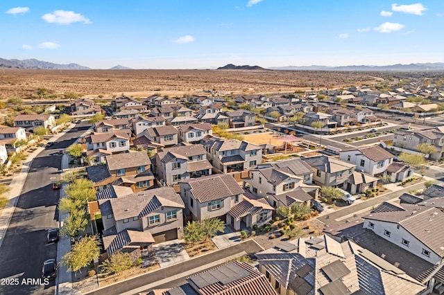 drone / aerial view featuring a mountain view