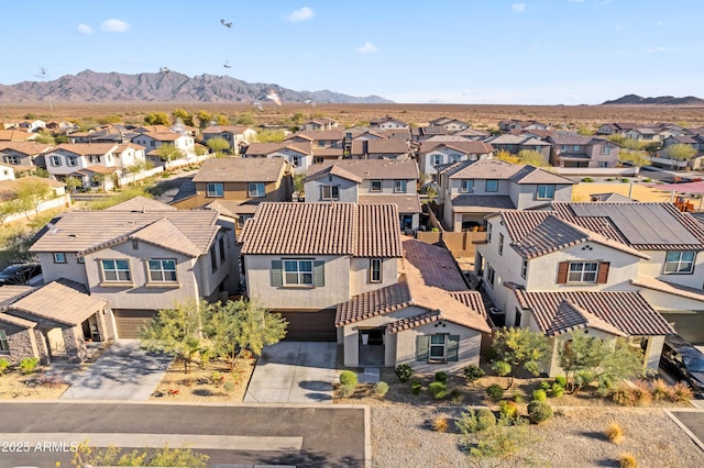 drone / aerial view featuring a mountain view