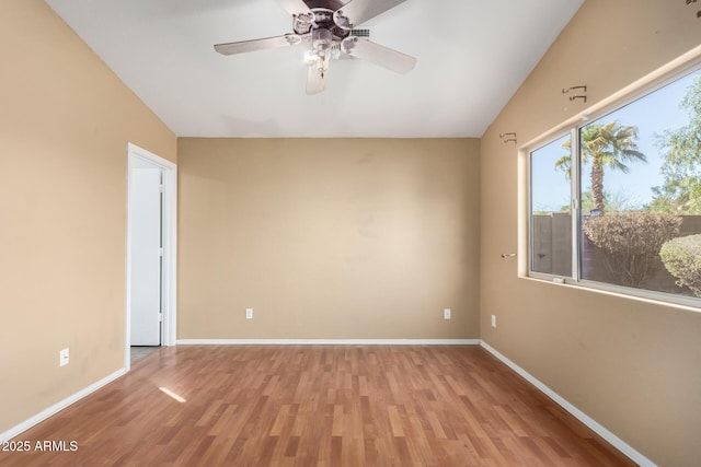 unfurnished room featuring ceiling fan and light hardwood / wood-style floors