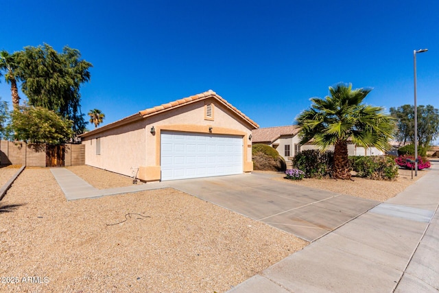 single story home with a garage