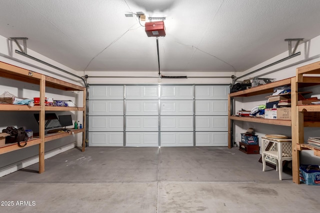 garage featuring a garage door opener