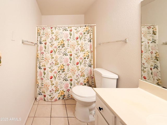 full bath featuring tile patterned floors, toilet, and vanity