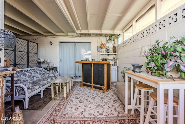 view of patio featuring an outdoor living space and exterior bar