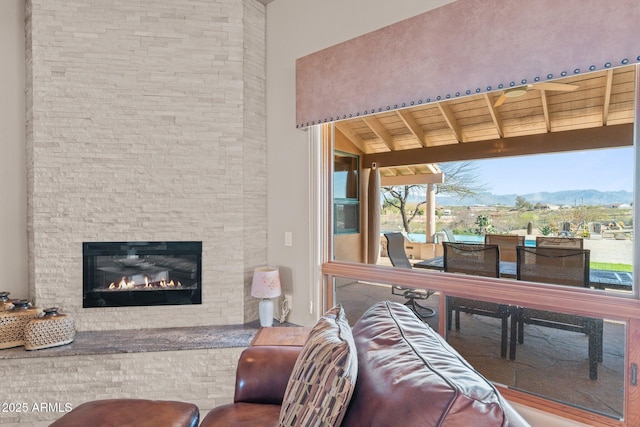 20910 W Cattle Iron Dr, Wickenburg, AZ 85390 - interior space featuring a glass covered fireplace