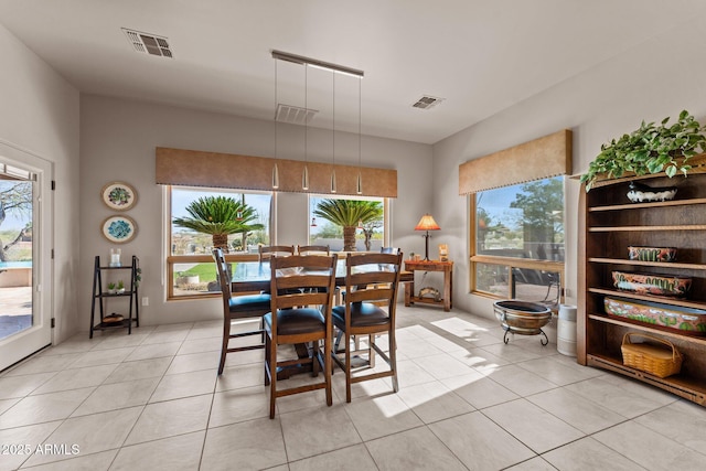 20910 W Cattle Iron Dr, Wickenburg, AZ 85390 - dining room with visible vents and light tile patterned floors