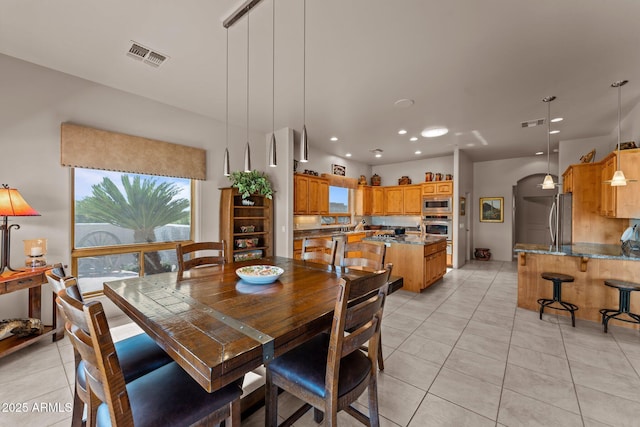 20910 W Cattle Iron Dr, Wickenburg, AZ 85390 - dining area with visible vents, recessed lighting, and light tile patterned floors