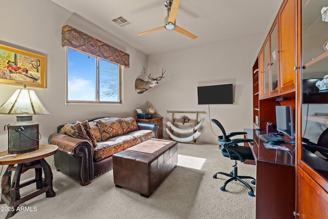 20910 W Cattle Iron Dr, Wickenburg, AZ 85390 - interior space with visible vents, carpet, and a ceiling fan
