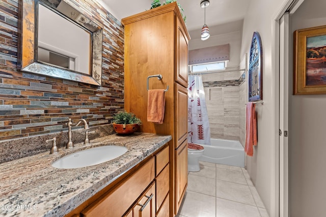 20910 W Cattle Iron Dr, Wickenburg, AZ 85390 - bathroom featuring toilet, backsplash, vanity, tile patterned flooring, and shower / bath combo with shower curtain