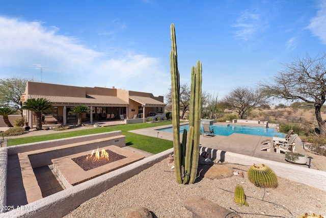 20910 W Cattle Iron Dr, Wickenburg, AZ 85390 - pool with an outdoor fire pit and a patio area
