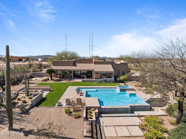 20910 W Cattle Iron Dr, Wickenburg, AZ 85390 - view of pool with a pool with connected hot tub, a patio, and a yard